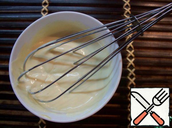 For sauce mix mayonnaise, yogurt and mustard. Wash the cabbage and cut the tender green part.