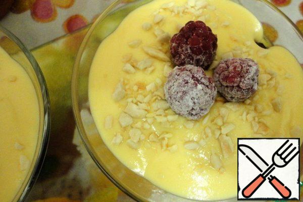 Then custard, some almonds and 3 raspberries.