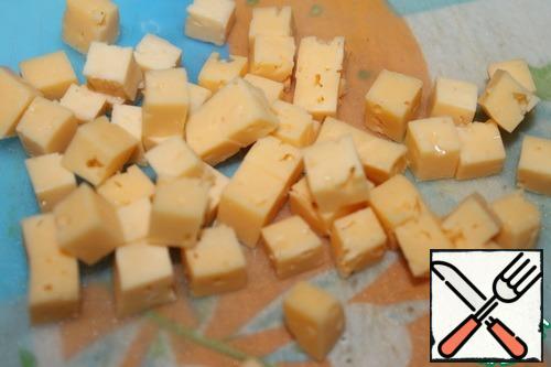 Cheese cut into cubes.