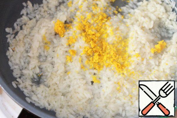 Minutes through 10 added orange peel. salt and pepper and continued to cook the rice, gradually adding the broth.