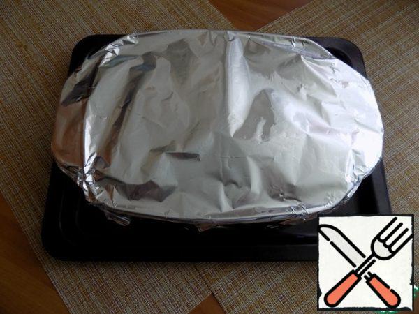 Cover the mold with foil. We put the mold right in the oven, I have a glass one. Set at t-180 and bake for up to 1 hour.
