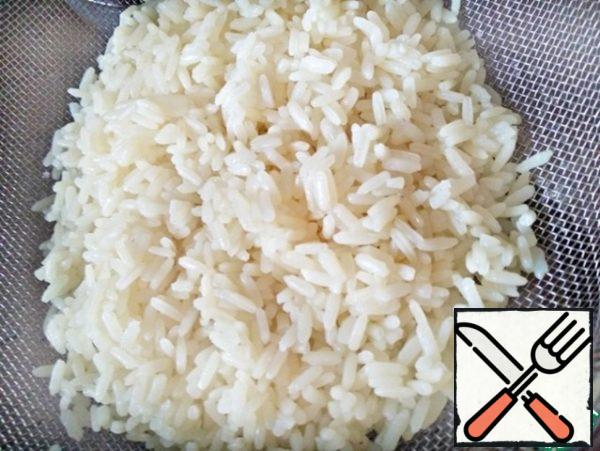Rice cook, wash under cold running water.