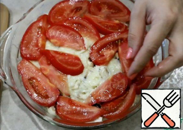 Spread on top of the tomatoes.