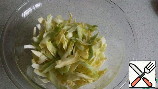 Slice the cabbage.
