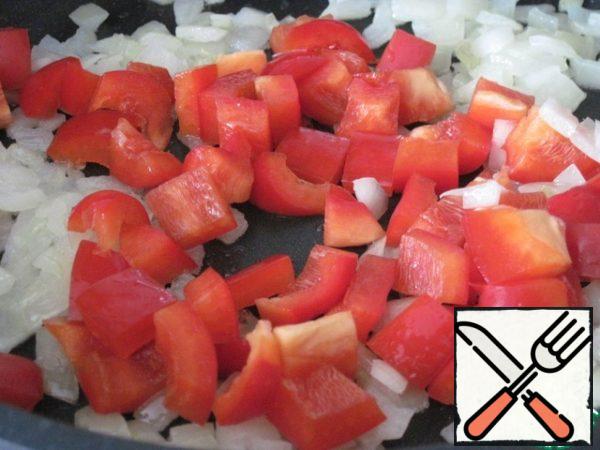 Add pepper and fry for 1-2 minutes.

