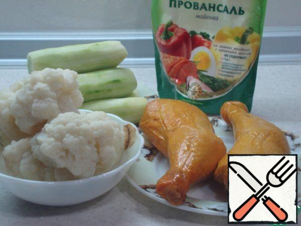 Cauliflower is disassembled into inflorescences and boiled to such a state that it crunches a little.
Peel the cucumbers. Peeled cucumbers give a more delicate taste.
Remove the skin from the shins.
