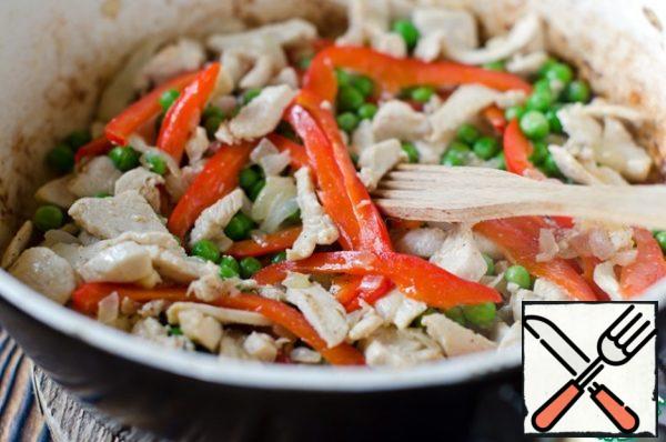 Add the bell pepper and green peas, pepper and cook for 2 minutes.
