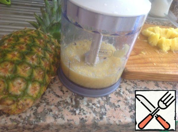 1/2 sliced pineapple chopped with a blender until the consistency of mashed potatoes.