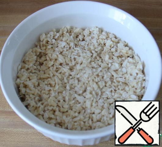 In a baking dish put a layer of rice (1 Cup of finished rice).