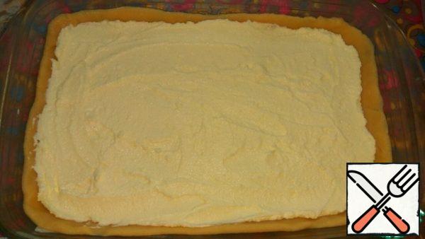 Then distribute the cottage cheese filling.