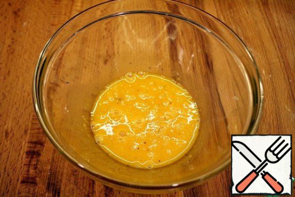Add salt and pepper to the yolk. Stir...