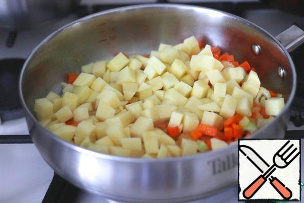 Add the potatoes.

