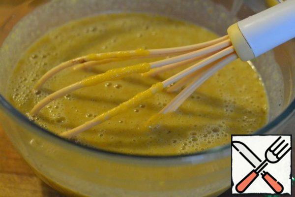 Add the cooled pumpkin puree to the milk mixture.
Mix it.

