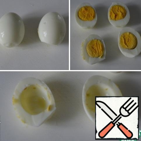 Boil eggs hard. To clear, cut in half. Get the yolk.