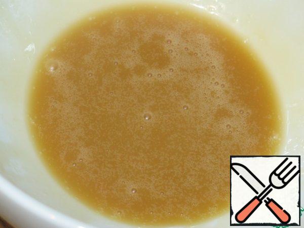Mix mayonnaise, vinegar, lemon juice, soy sauce, sesame oil and honey with a whisk.