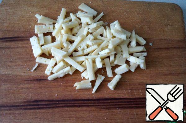 Cheese cut into small cubes.