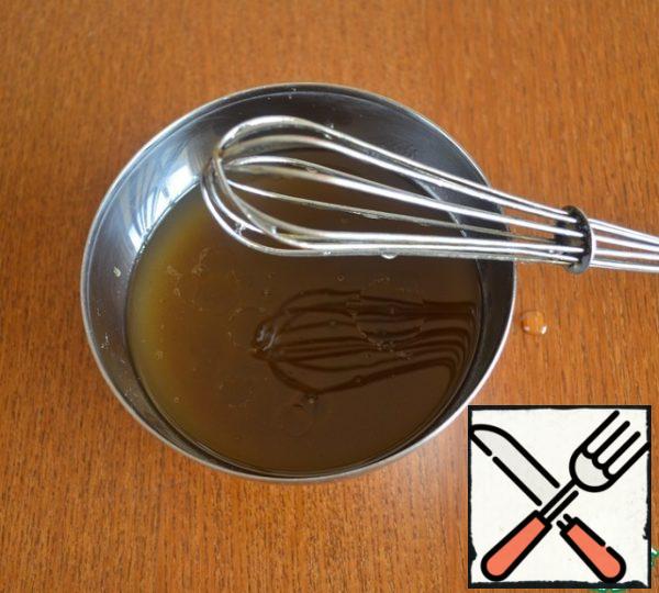 For the dressing, mix the soy sauce, fish sauce, lime juice and brown sugar in a bowl with a whisk.