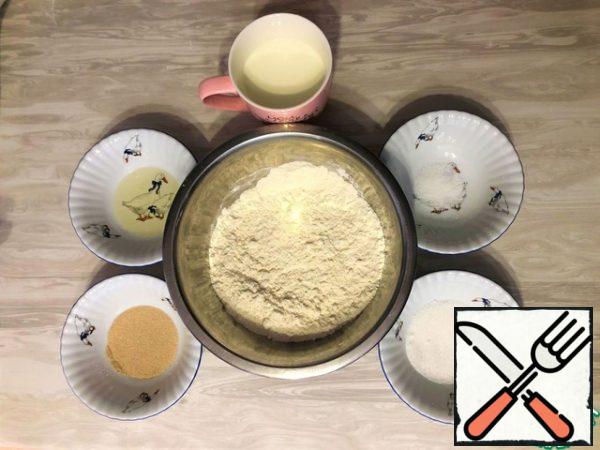 Make the dough. In yeast adding sugar, drowning our small number of milk and will abandon infuse 10 shadowing Then in flour again adding where sea salt, oil vegetable, yeast and the remnants of milk. Knead the dough, cover it with a towel and put in a warm place for 1-1.5 hours.