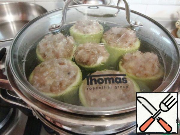 Put the steamer insert into a pot of boiling water, close the lid and cook for 25-30 minutes.