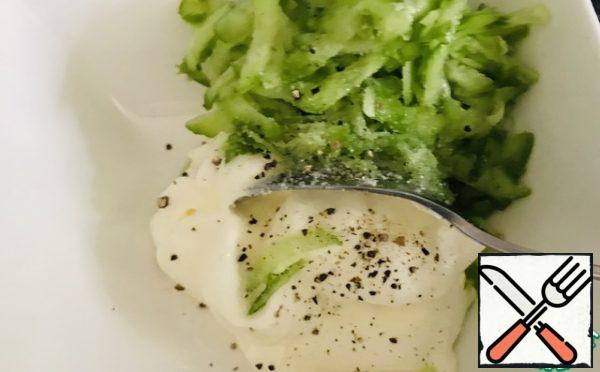 Greek yogurt + peeled cucumber grate + salt + pepper-to taste, add lemon juice to taste. Mix it.
