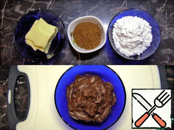 Make some fudge. Mix softened butter, powdered sugar and cocoa. You can cover these cookies with any glaze, I tried different ones: milk, orange glaze, chocolate ganache... However, after all the experiments, I returned to the original version that you suggest.
Considering that the dough turns out not sweet, you can put more powdered sugar, focusing on your taste.
