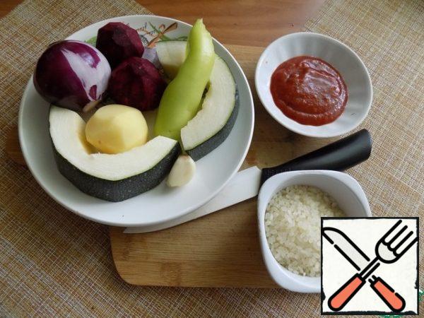Put a pot of water on the fire. When the water boils, spread the rice. Prepare food for the soup. In the soup I'll take 1 piece of potatoes, t to I'll put zucchini in it. After 10 minutes of cooking rice, put potatoes, cut into a small cube.