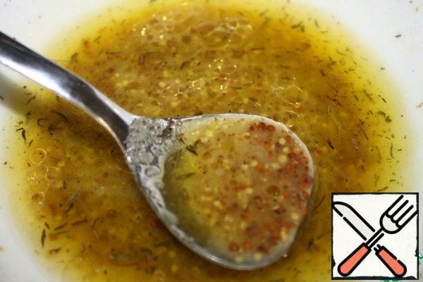 Mix olive oil, lemon juice, mustard, dry thyme and finely chopped green onions.
Salt and ground black pepper to taste.
Mustard should be grainy, not spicy!