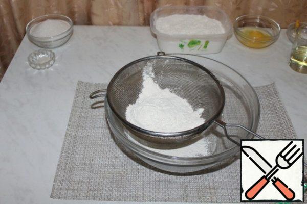 Sift 125 grams of flour.