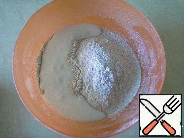 Place flour, kefir, salt in a bowl