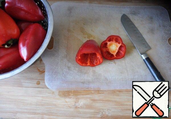 Wash pepper, carefully cut off the top, clean. If pepper a minor, reserve whole, the average cut in half, large on 4 parts of. Though it is possible to stuff pepper of any size entirely, and further at giving to cut. That's your decision.