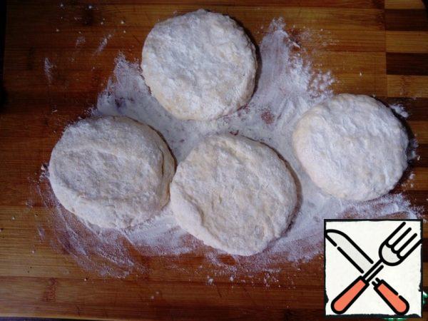 Divide the dough into equal parts (I got four balls) with flour.
