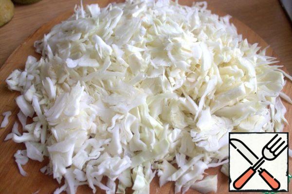 Chop the cabbage.
