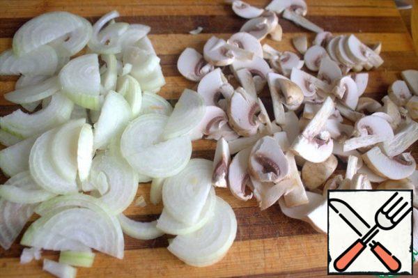 Finely chop the onion and mushrooms.

