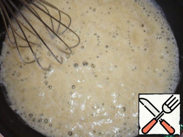Fry flour, stirring all the time with a whisk.