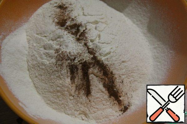Mix the dry ingredients: flour, baking powder, salt, cinnamon.
