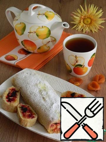 Put the roll in the form on parchment and bake in a heated 180 degree oven for 30-45 minutes. The shape is desirable to use a rectangular size of the roll. Ready roll sprinkle with powdered sugar. Enjoy your tea!