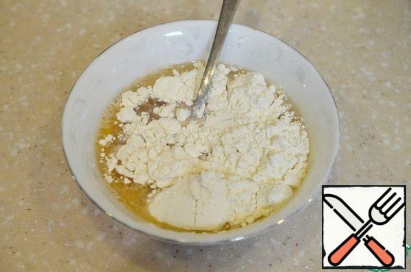 Add butter, milk, flour and baking powder.