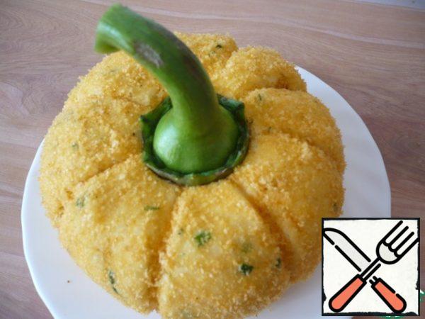 Cut a knife from the pepper stalk and set it on top of the cheese ball in the form of a pumpkin stalk.
