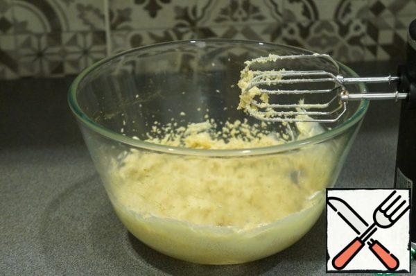 Whisk together the sugar and butter.
