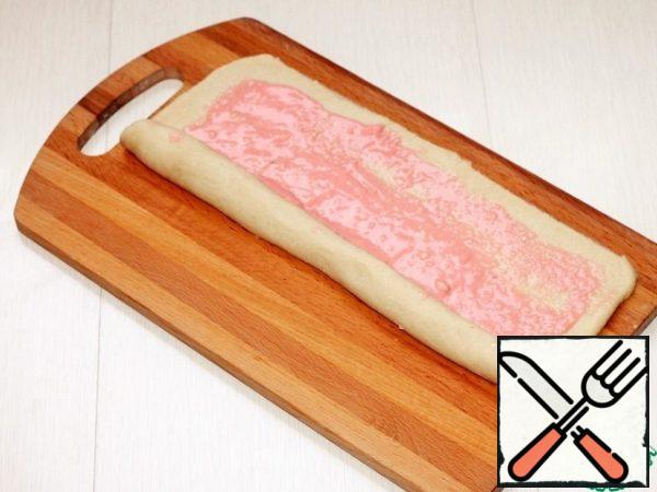 Fold each layer of dough into a roll.