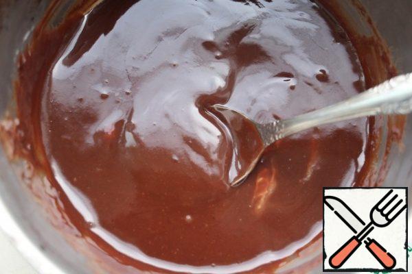 Melt the chocolate with honey, cream and thyme leaves and allow to cool to room temperature and pour on top of cake.