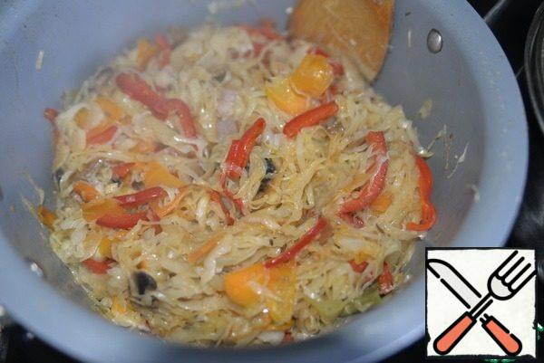 Mix vegetables with mushrooms, simmer over medium heat until tender for 10 minutes.
