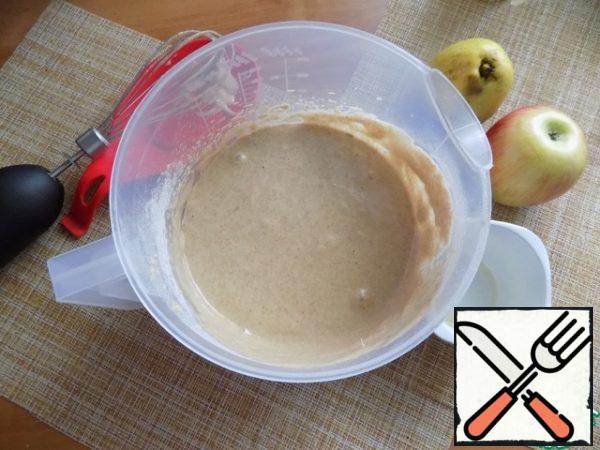 The dough is ready. I'll take one apple and one pear for the pie. You can take just apples or just pears.
