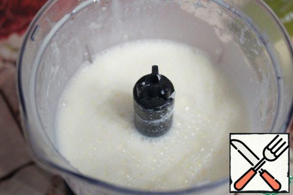 Eggs, sour cream, half cheese and starch mix in a blender.