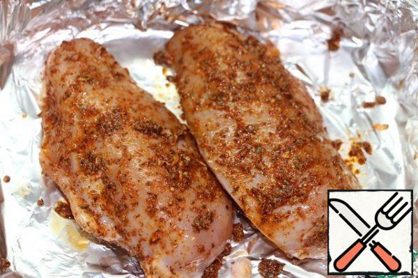 After the meat has lain in a saline solution for 1 hour, remove it, dry it, and spread with a spicy mixture.
Bake in the oven for 30 minutes at 180 degrees.