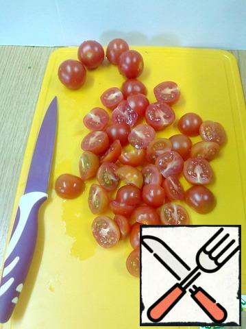 Cherry tomatoes cut into halves.