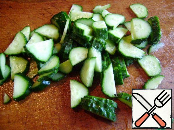 
Cucumbers cut into half rings.