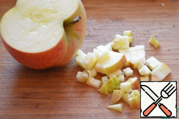 Cut the apple into cubes.
