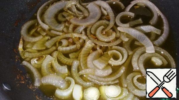 Fry onions in olive oil until softened.