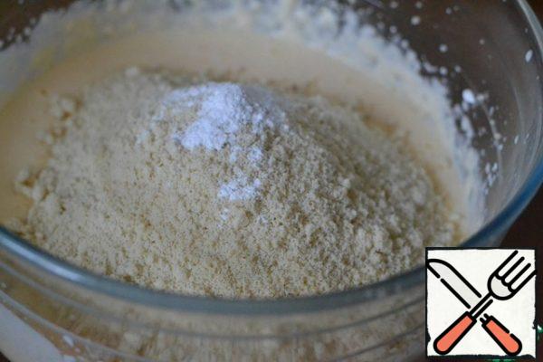 Grind the remaining 150g nuts.
Add to liquid mixture. Add baking powder dough. Stir.
